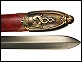 cliquez sur l'image pour l'agrandir : d&eacute;tail du fourreau (dragon et ''Excalibur'' / ''King Arthur'')