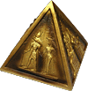 pyramide en r&eacute;sine, couleur vieil or, avec hauts-reliefs repr&eacute;sentant des sc&egrave;nes de la mythologie &eacute;gyptienne