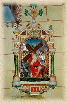 J&eacute;sus est charg&eacute; de sa croix