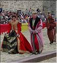 Le roi et la reine d'Aragon suivis d'un moine franciscain